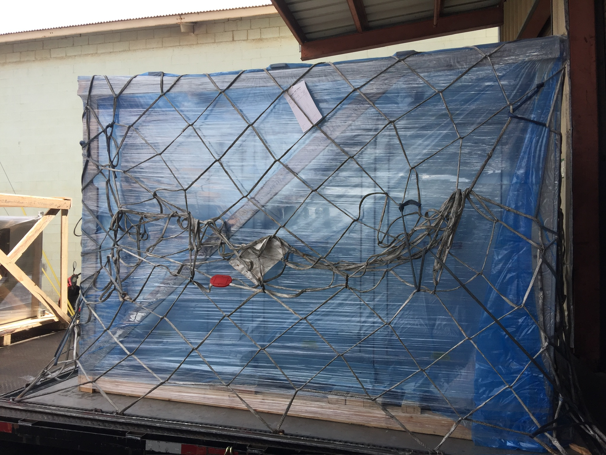 Secured project freight prepared for ocean shipment